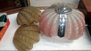 An art deco clam shell ceiling light and 3 spare shells