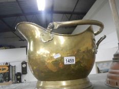 An old brass coal helmet