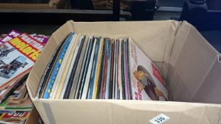A box of records including Sex Pistols,