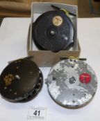 3 vintage reels being Merlin,