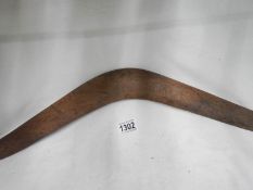 An old Australian boomerang with decoration of emu,