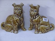2 treble glazed pug dogs