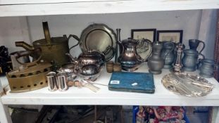 A box of various metalware including cutlery