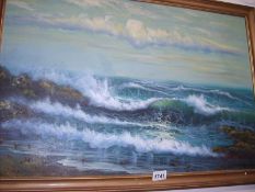An oil on canvas of a seascape signed Garceau, approx. size of canvas 30.