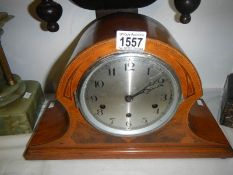 An inlaid mantel clock with Westminster chimes