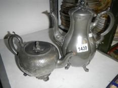 A pewter tea and coffee pot
