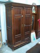 A 19th century French double wardrobe