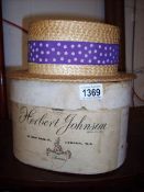 A Herbert Johnson straw boater with hat box