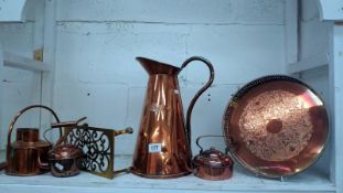 A mixed lot of copper and brass including large jug, kettles,