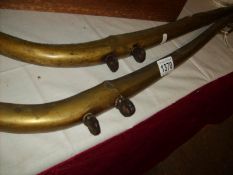 A pair of brass horse hames