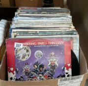 A box of records including Thin Lizzy
