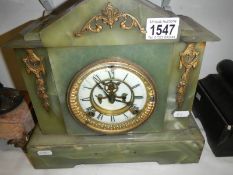 A French green onyx mantel clock (missing key and pendulum)