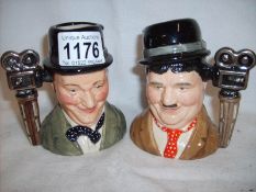 A pair of Royal Doulton Laurel and Hardy character jugs,