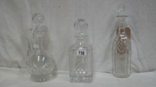 2 fine decanters and an early 20th century wine carafe