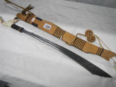 A head hunter's sword from Borneo with bone grip