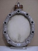 An old plaster frame with Imperial Crown