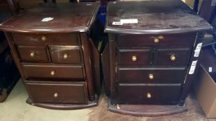 A small dark stained chest of drawers