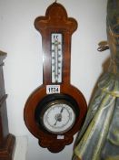 An Edwardian inlaid barometer