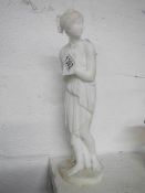An alabaster Grecian style figure