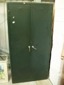 A metal 2 door filing cabinet (marked Hilner or Milner)