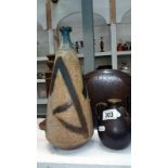 An art potter vase and a pottery mask jug