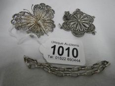 2 silver Malta brooches (unmarked) and a silver bracelet