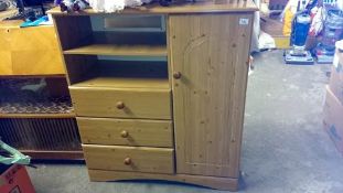 A pine effect cabinet