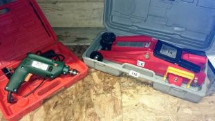 A hydraulic floor jack & a Black & Decker drill