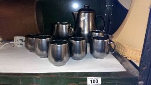 A quantity of silver coloured tea ware