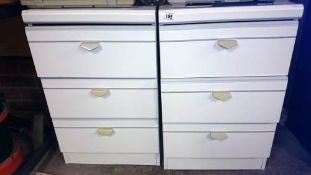 A pair of 3 drawer bedroom chests