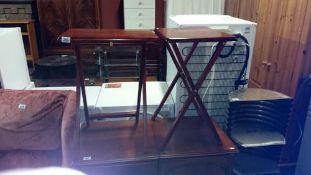 A pair of folding tables