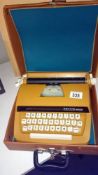 A child's 'Petite' typewriter with case