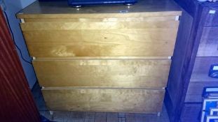 A chest of 3 drawers