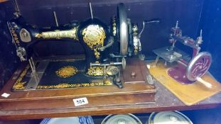 A Jones sewing machine & a child's sewing machine