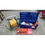 A hose reel & box of tools