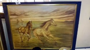 A painting on board of horses (signed)