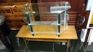 A glass coffee table & teak coffee table