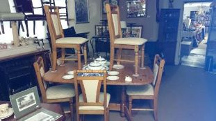 A dining table & 6 chairs