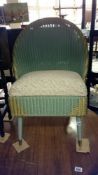 A Lloyd loom bedroom chair