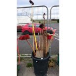 A bin of garden tools etc.