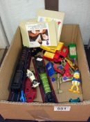 A quantity of miscellaneous toy cars & trains etc.