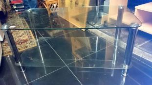 A chrome glass coffee table