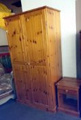 A pine wardrobe & matching bedside cabinet