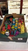 A quantity of toy cars etc.