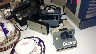 3 Polaroid cameras & a Sony radio