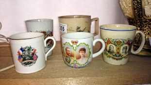 A collection of early 20th century commemorative mugs & 19th century tankards