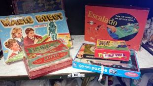 A quantity of board games including Escalado