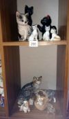 A quantity of 'cat' figurines including Leonardo