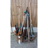 A quantity of garden tools etc.