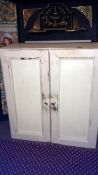 A painted bathroom cabinet